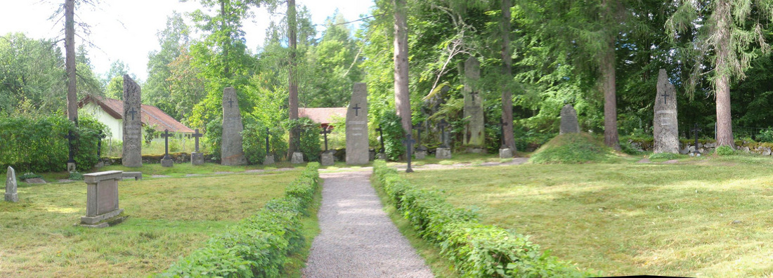 The Cemetery at Boo Kyrka Titan Tall Head Stones.